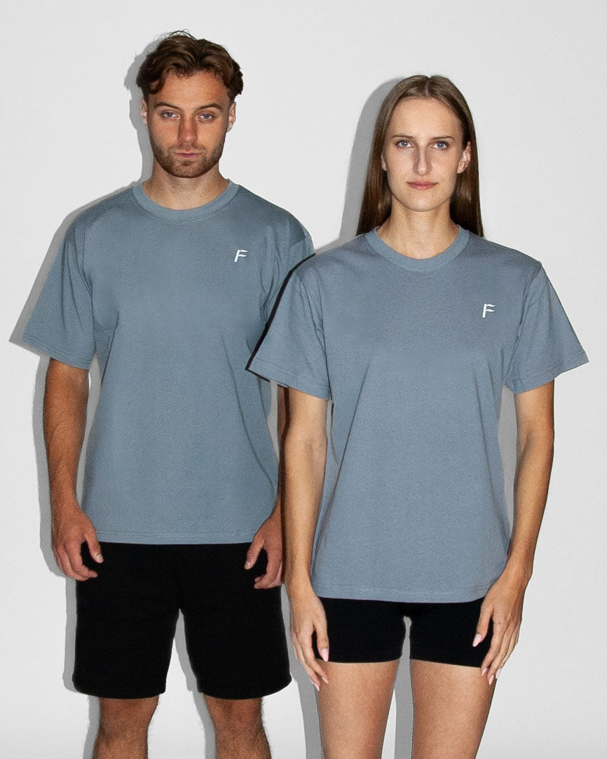 Fanatique Sportswear oversized unisex sport shirt middenblauw dames en heren sport shirt