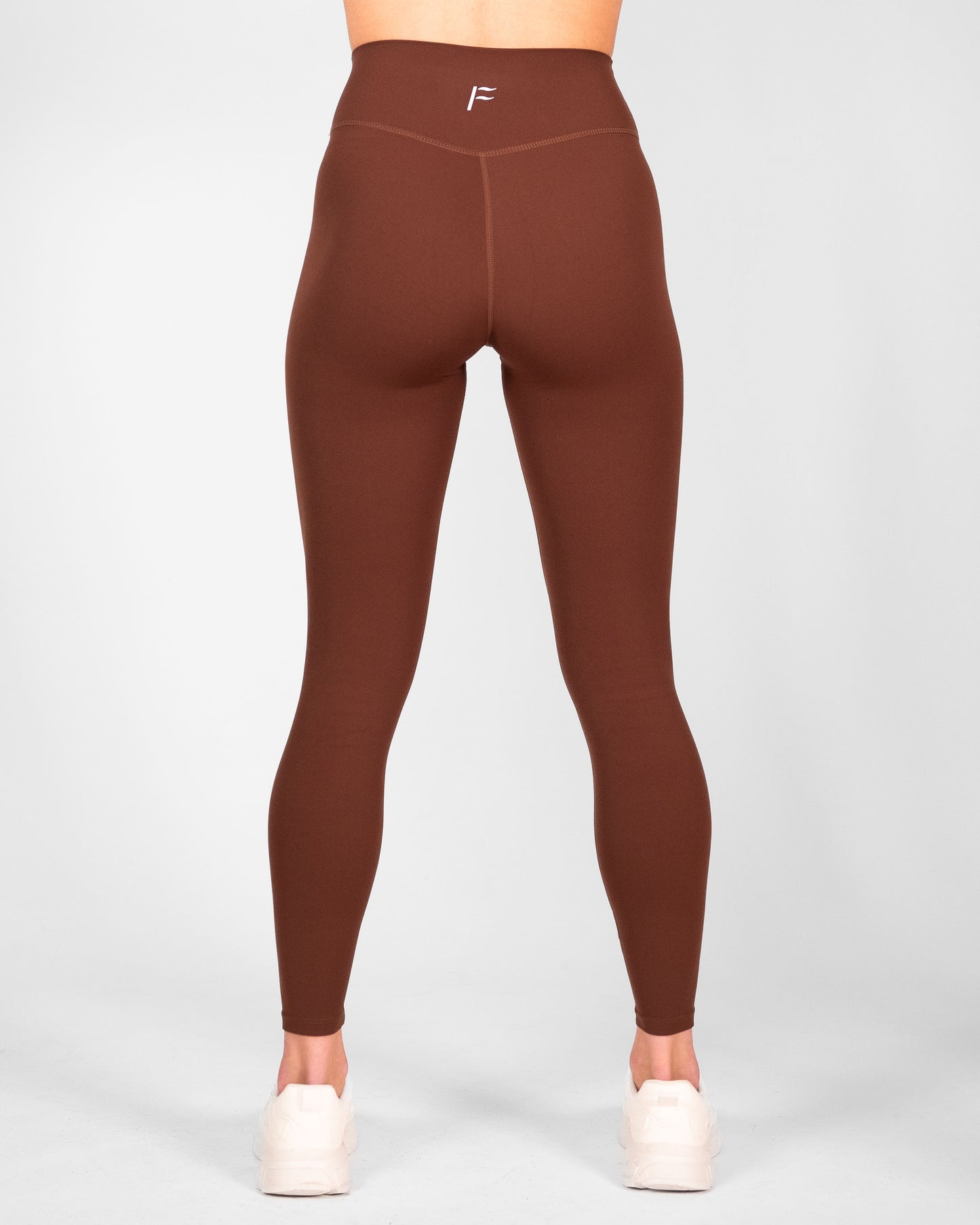 achterkant dames sportlegging donkerbruin donkerbruine sportlegging dames squatproof sportlegging dames squat proof Fanatique Sportswear
