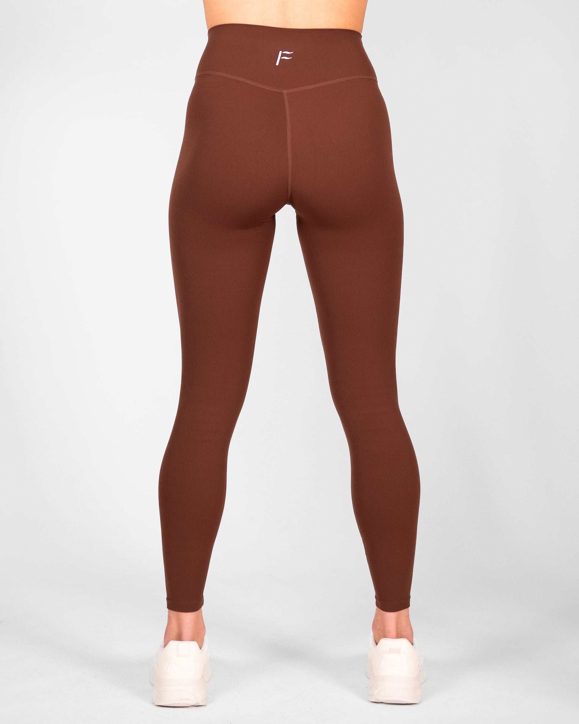 achterkant dames sportlegging donkerbruin donkerbruine sportlegging dames squatproof sportlegging dames squat proof Fanatique Sportswear