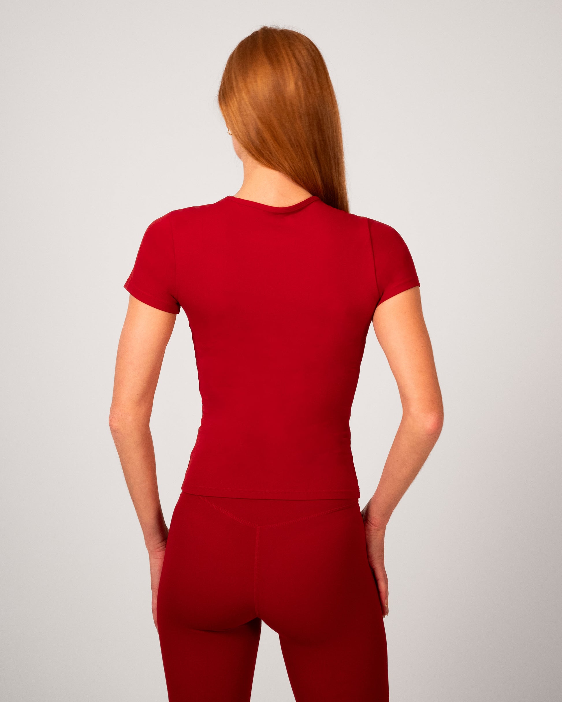 achterkant rood sport shirt dames fitness shirt seamless stretch naadloos sport shirt t-shirt dames seamless sport shirt  Fanatique Sportswear