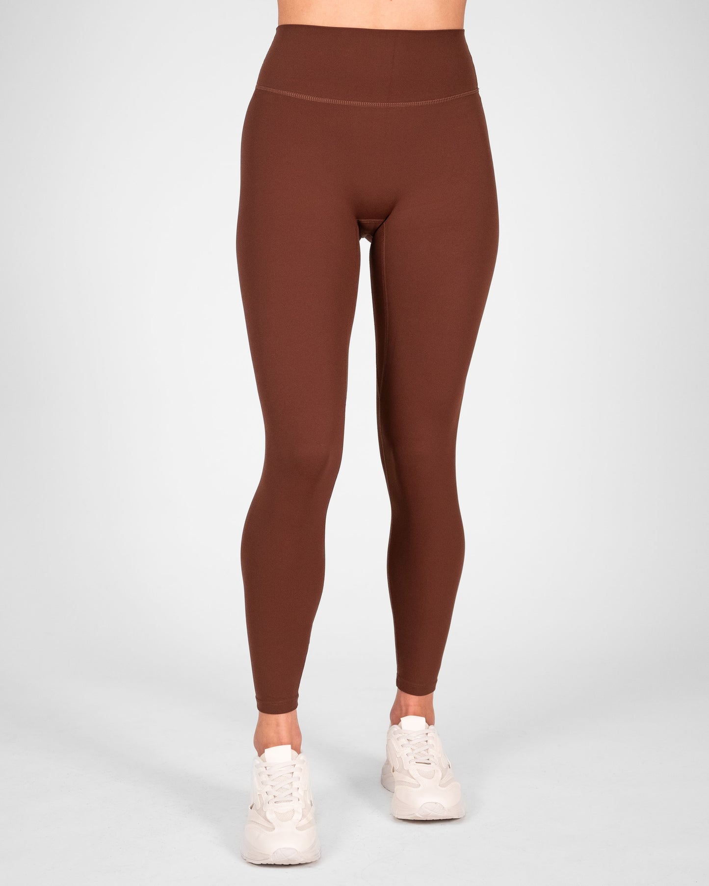 voorkant dames sportlegging donkerbruin donkerbruine sportlegging dames squatproof sportlegging dames squat proof Fanatique Sportswear