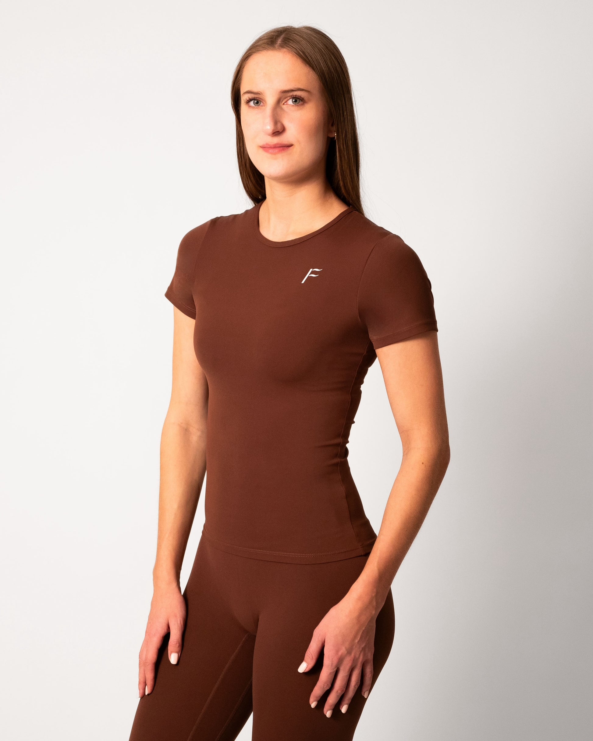 voorkant donkerbruin sport shirt dames fitness shirt seamless stretch naadloos sport shirt t-shirt dames seamless sport shirt  Fanatique Sportswear